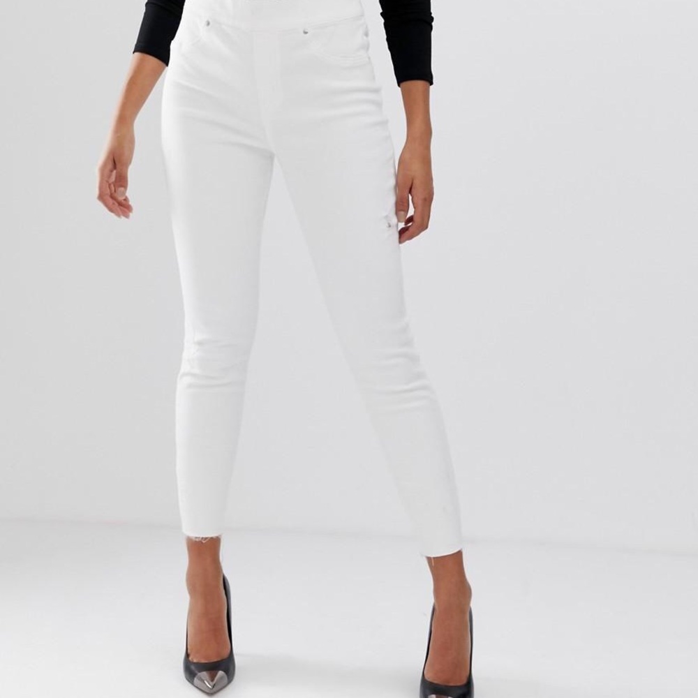 Spanx white distressed skinny jeans